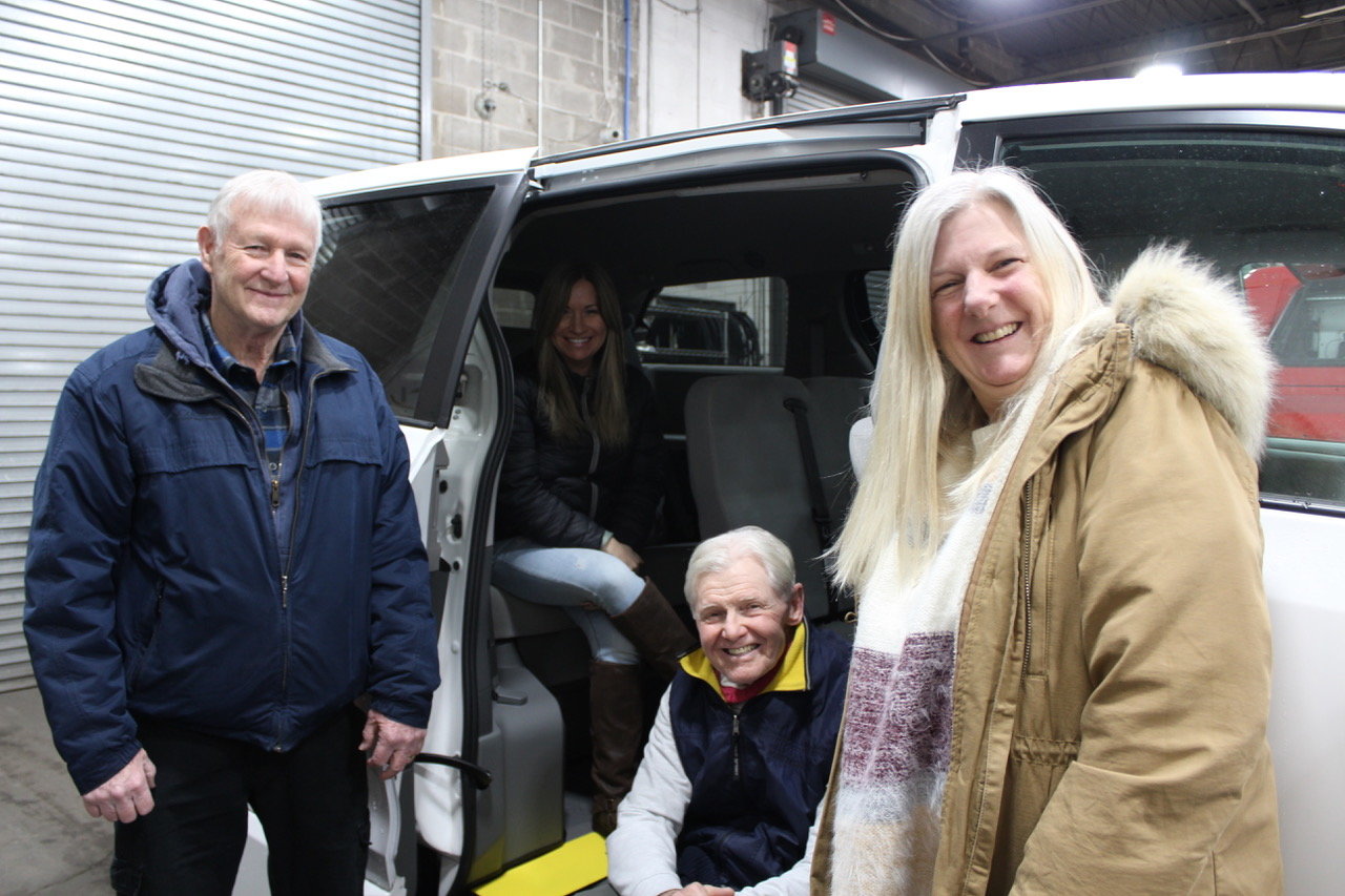 Celebrating the new Bellport Village senior van are (left to right) Don Mullins (back seat), Tara Crane, Ray Fell and Katy Mehrkens.